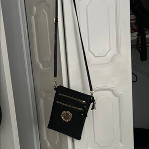 Black Crossbody Bag with Gold Accents